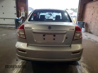 2010 Suzuki SX4 with VIN JS2YC5A49A6310256, listed as a Copart auction lot 73210584 with 135,021 mi miles and Salvage Title. Bid and sale history available at DreamBid. Image 6.