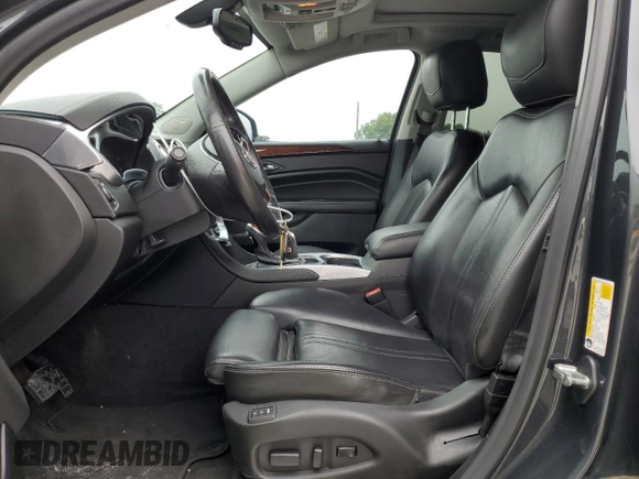 2015 Cadillac SRX Performance Collection with VIN 3GYFNCE38FS597717, listed as a Copart auction lot 57629615 with 102,689 mi miles and Salvage title. Bid and sale history available at DreamBid. Image 7.