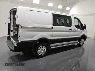 2024 Ford Transit Cargo with VIN 1FTBR1Y88RKA33375, listed as a Copart auction lot 77019444 with 7,771 mi miles and Clean Title. Bid and sale history available at DreamBid. Image 3.