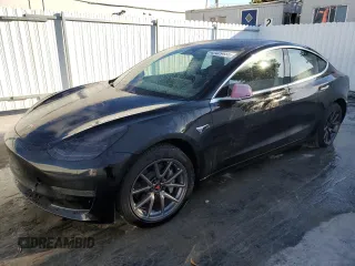 2020 Tesla Model 3 Standard Range Plus with VIN 5YJ3E1EA3LF784699, listed as a Copart auction lot 43409685 with 72,933 mi miles and Clean Title. Bid and sale history available at DreamBid. Image 1.