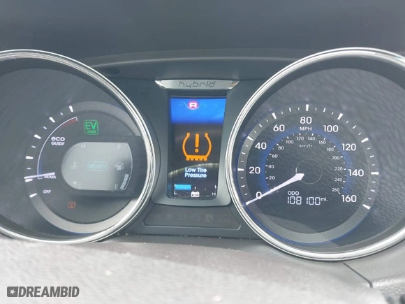 2012 Hyundai Sonata Hybrid with VIN KMHEC4A49CA041193, listed as a IAAI auction lot 41663678 with 108,100 mi miles. Bid and sale history available at carsss.com. Image 7.
