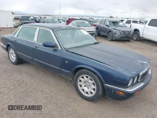 1998 Jaguar XJ with VIN SAJHX6242WC820445, listed as a IAAI auction lot 42073301 with Not provided miles and . Bid and sale history available at DreamBid. Image 1.