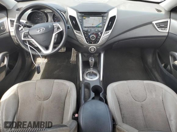 2012 Hyundai Veloster w/Black Int с VIN KMHTC6AD7CU031425, выставлен на аукционе Copart как лот 58536005 с пробегом 68 510 миль миль и Списание • Salvage title. История ставок и продаж доступна на DreamBid. Изображение 8.