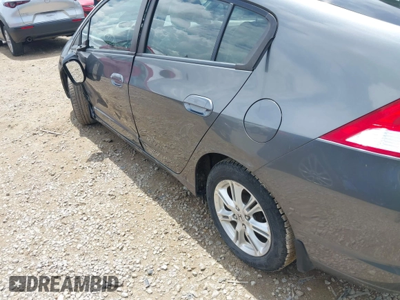 2010 Honda Insight EX with VIN JHMZE2H71AS008487, listed as a IAAI auction lot 42533409 with 95,765 mi miles and . Bid and sale history available at DreamBid. Image 17.
