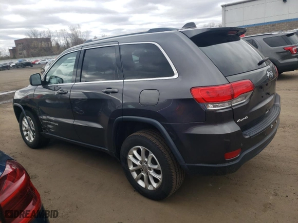 2015 Jeep Grand Cherokee Altitude with VIN 1C4RJFAG0FC209734, listed as a Copart auction lot 52973105 with 130,955 mi miles and Salvage Title. Bid and sale history available at carsss.com. Image 2.