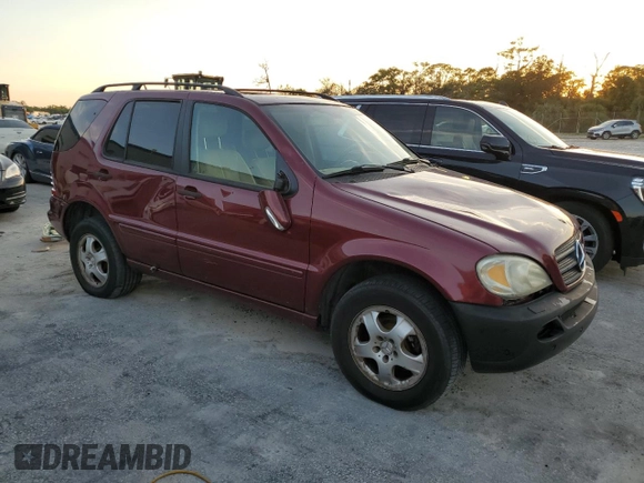 2002 Mercedes-Benz M-Class with VIN 4JGAB54E72A300774, listed as a Copart auction lot 75990134 with 312,541 mi miles and Salvage Title. Bid and sale history available at carsss.com. Image 4.