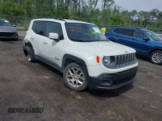 2016 Jeep Renegade Latitude z VIN ZACCJABT5GPE09252, wystawiony jako IAAI lot #42088487 z przebiegiem 45 161 mil mil oraz . Historia ofert i sprzedaży dostępna na DreamBid. Obrazek 1.