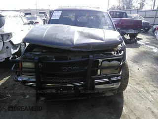 1993 GMC Suburban with VIN 1GKEC16K9PJ754213, listed as a IAAI auction lot 22062516 with 212,780 mi miles. Bid and sale history available at carsss.com. Image 6.