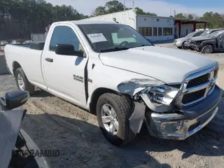 2015 Ram 1500 Tradesman with VIN 3C6JR6DT2FG559501, listed as a IAAI auction lot 41664205 with 170,433 mi miles and . Bid and sale history available at DreamBid. Image 1.