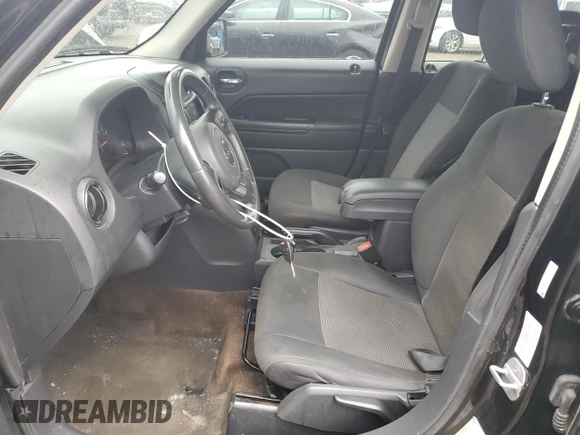 2013 Jeep Patriot Latitude with VIN 1C4NJPFB1DD255761, listed as a Copart auction lot 52772015 with 184,635 mi miles and Salvage Title. Bid and sale history available at carsss.com. Image 7.