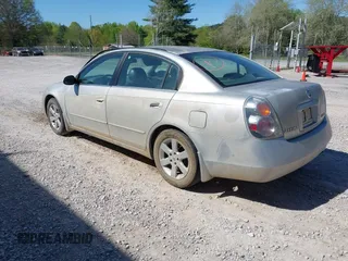 2002 Nissan Altima S with VIN 1N4AL11D12C166490, listed as a IAAI auction lot 42056634 with 203,367 mi miles. Bid and sale history available at carsss.com. Image 3.
