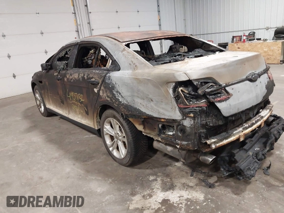 2014 Ford Taurus SEL with VIN 1FAHP2E81EG136022, listed as a IAAI auction lot 41937132 with 76,285 mi miles and . Bid and sale history available at DreamBid. Image 3.