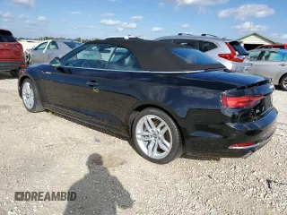 2019 Audi A5 Cabriolet Premium z VIN WAUWNGF56KN010302, wystawiony jako Copart lot #65011662 z przebiegiem Nie podano mil oraz . Historia ofert i sprzedaży dostępna na DreamBid. Obrazek 2.