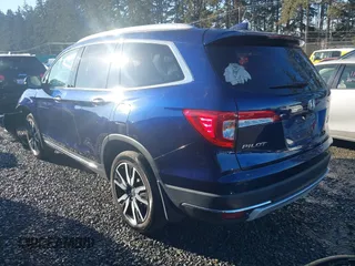 2022 Honda Pilot Touring 7-Passenger with VIN 5FNYF6H60NB043212, listed as a IAAI auction lot 41448994 with 41,660 mi miles. Bid and sale history available at carsss.com. Image 3.