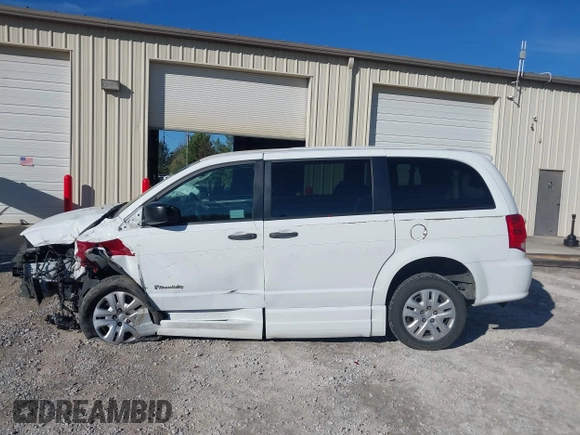 2019 Dodge Grand Caravan SE with VIN 2C7WDGBG7KR803126, listed as a IAAI auction lot 40835937 with 63,100 mi miles and . Bid and sale history available at DreamBid. Image 15.