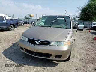 2004 Honda Odyssey EX-L with VIN 5FNRL18934B107378, listed as a Copart auction lot 51972795 with 186,043 mi miles and Salvage Title. Bid and sale history available at DreamBid. Image 11.