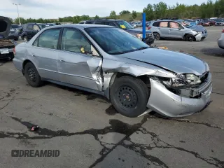 2002 Honda Accord LX z VIN JHMCG56442C016427, wystawiony jako Copart lot #57806335 z przebiegiem 176 816 mil mil oraz Szkoda całkowita • Salvage title. Historia ofert i sprzedaży dostępna na DreamBid. Obrazek 4.