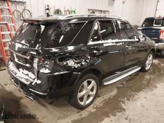 2016 Mercedes-Benz GLE with VIN 4JGDA5HB5GA797279, listed as a IAAI auction lot 41374979 with 92,672 mi miles. Bid and sale history available at carsss.com. Image 4.