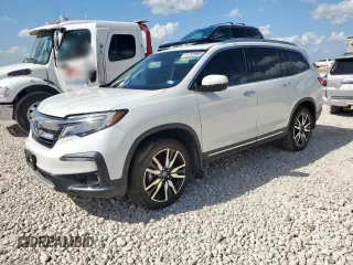 2020 Honda Pilot Touring 7-Passenger with VIN 5FNYF6H69LB018905, listed as a Copart auction lot 61209685 with 61,637 mi miles and Salvage title. Bid and sale history available at DreamBid. Image 1.