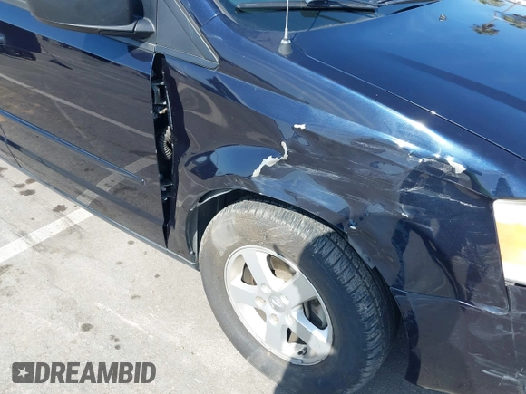 2010 Dodge Grand Caravan SE with VIN 2D4RN4DEXAR195055, listed as a IAAI auction lot 42012341 with 90,748 mi miles and . Bid and sale history available at DreamBid. Image 6.