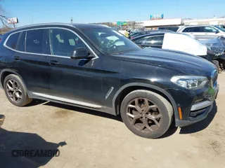 2021 BMW X3 sDrive30i with VIN 5UXTY3C00M9F94174, listed as a IAAI auction lot 41628837 with 53,996 mi miles. Bid and sale history available at carsss.com. Image 1.