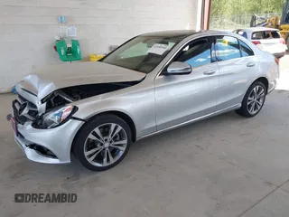2017 Mercedes-Benz C 300 with VIN 55SWF4KB3HU179239, listed as a IAAI auction lot 42100360 with 121,396 mi miles and . Bid and sale history available at DreamBid. Image 2.