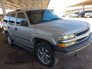 2005 Chevrolet Tahoe LT z VIN 1GNEK13T35R243047, wystawiony jako IAAI lot #42101652 z przebiegiem 216 632 mil mil oraz . Historia ofert i sprzedaży dostępna na DreamBid. Obrazek 1.