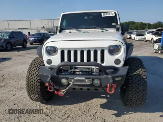 2016 Jeep Wrangler Unlimited Sport with VIN 1C4BJWDG0GL187779, listed as a Copart auction lot 62480015 with 109,296 mi miles and Salvage title. Bid and sale history available at DreamBid. Image 5.