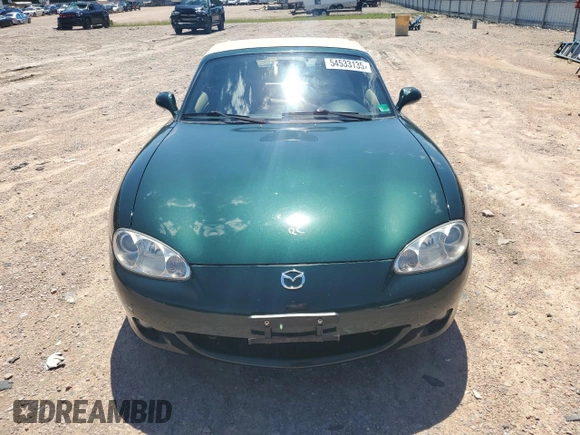 2003 Mazda MX-5 Miata Cloth with VIN JM1NB353630312509, listed as a Copart auction lot 54533135 with 71,269 mi miles and Clean Title. Bid and sale history available at DreamBid. Image 5.