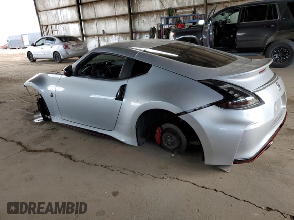 2015 Nissan 370Z Nismo z VIN JN1AZ4EH1FM441060, wystawiony jako Copart lot #53423725 z przebiegiem Nie podano mil oraz Szkoda całkowita • Salvage title. Historia ofert i sprzedaży dostępna na DreamBid. Obrazek 2.