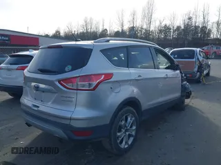 2014 Ford Escape Titanium with VIN 1FMCU0JX3EUB22005, listed as a IAAI auction lot 41610799 with 248,066 mi miles. Bid and sale history available at carsss.com. Image 4.