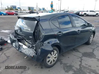 2014 Toyota Prius One with VIN JTDKDTB39E1071253, listed as a IAAI auction lot 41734442 with 233,895 mi miles and . Bid and sale history available at DreamBid. Image 4.