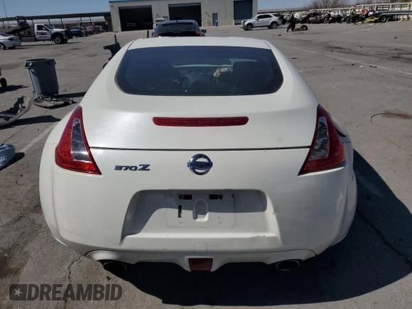2014 Nissan 370Z Nismo with VIN JN1AZ4EH2EM633022, listed as a Copart auction lot 46947575 with 115,042 mi miles and Salvage Title. Bid and sale history available at DreamBid. Image 6.