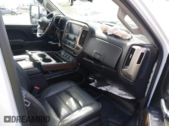 2019 GMC Sierra 2500HD Denali z VIN 1GT12SEY3KF269442, wystawiony jako IAAI lot #42231991 z przebiegiem 75 172 mil mil oraz . Historia ofert i sprzedaży dostępna na DreamBid. Obrazek 5.
