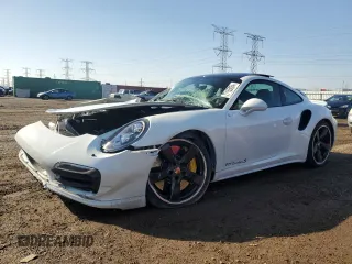 2015 Porsche 911 Turbo S with VIN WP0AD2A9XFS160370, listed as a Copart auction lot 77165054 with 19,235 mi miles and Salvage Title. Bid and sale history available at carsss.com. Image 1.