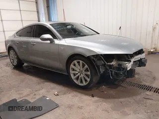 2014 Audi A7 Premium Plus z VIN WAUWGAFC6EN085365, wystawiony jako IAAI lot #41583815 z przebiegiem 146 093 mil mil oraz . Historia ofert i sprzedaży dostępna na DreamBid. Obrazek 1.