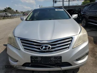 2013 Hyundai Azera z VIN KMHFH4JG8DA213103, wystawiony jako Copart lot #57781955 z przebiegiem 173 515 mil mil oraz Czysty tytuł • Clean title. Historia ofert i sprzedaży dostępna na DreamBid. Obrazek 5.