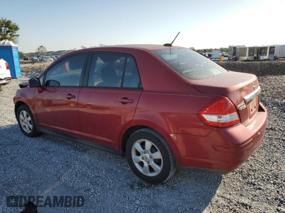 2010 Nissan Versa S with VIN 3N1BC1AP6AL443004, listed as a Copart auction lot 52010495 with 118,801 mi miles and Non Repairable. Bid and sale history available at DreamBid. Image 2.