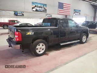 2013 Chevrolet Silverado 1500 LTZ with VIN 1GCRKTE72DZ414083, listed as a Copart auction lot 49009385 with 180,241 mi miles and Salvage Title. Bid and sale history available at DreamBid. Image 3.