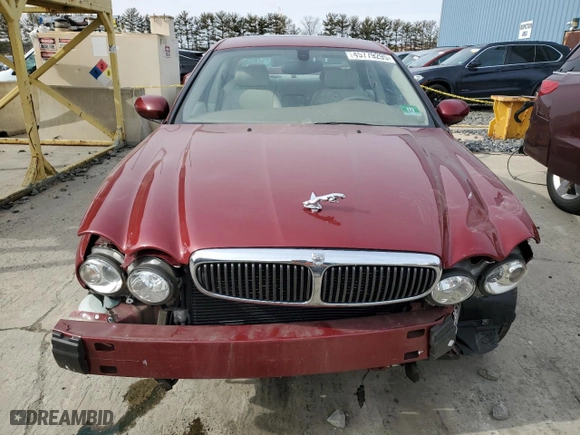 2002 Jaguar X-Type with VIN SAJEA51C32WC44965, listed as a Copart auction lot 45779295 with 48,225 mi miles and Salvage Title. Bid and sale history available at carsss.com. Image 5.
