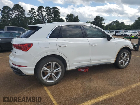 2020 Audi Q3 S line Premium with VIN WA1DECF32L1104309, listed as a Copart auction lot 57162424 with 68,523 mi miles and Salvage title. Bid and sale history available at DreamBid. Image 3.