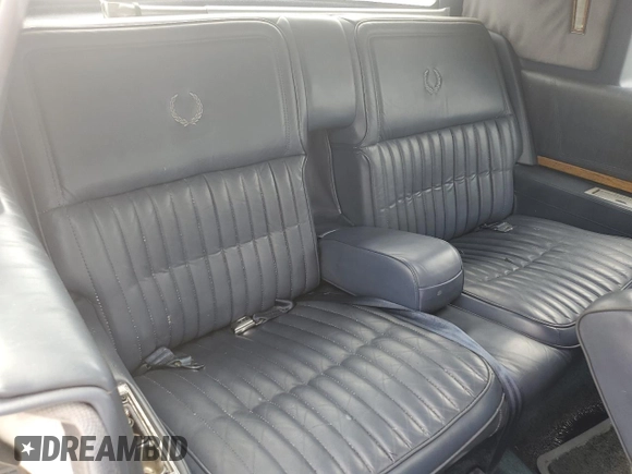 1984 Cadillac Eldorado z VIN 1G6AL5783EE654296, wystawiony jako Copart lot #74945374 z przebiegiem 37 040 mil mil oraz Szkoda całkowita • Salvage title. Historia ofert i sprzedaży dostępna na DreamBid. Obrazek 10.