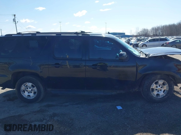 2011 Chevrolet Suburban LT with VIN 1GNSKJE30BR201074, listed as a IAAI auction lot 41986073 with 182,611 mi miles. Bid and sale history available at carsss.com. Image 13.