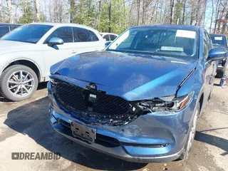 2020 Mazda CX-5 Grand Touring with VIN JM3KFBDM9L0756826, listed as a IAAI auction lot 41866290 with 145,567 mi miles. Bid and sale history available at carsss.com. Image 6.