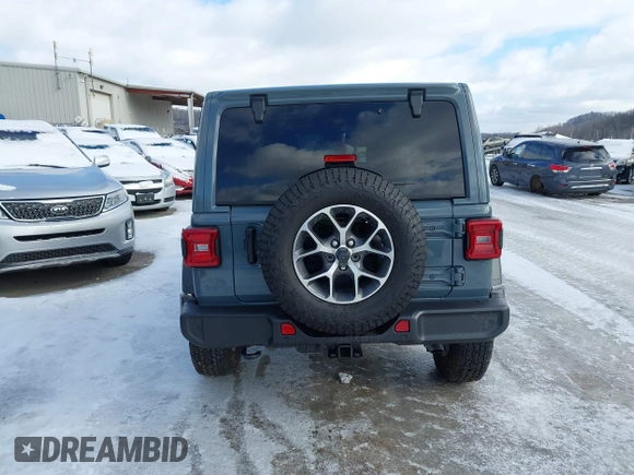 2024 Jeep Wrangler Sport S with VIN 1C4PJXDN2RW306332, listed as a IAAI auction lot 41036573 with 1,785 mi miles and . Bid and sale history available at DreamBid. Image 16.