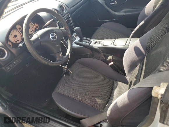 2003 Mazda MX-5 Miata Cloth z VIN JM1NB353630305964, wystawiony jako Copart lot #58517505 z przebiegiem 129 675 mil mil oraz Szkoda całkowita • Salvage title. Historia ofert i sprzedaży dostępna na DreamBid. Obrazek 7.