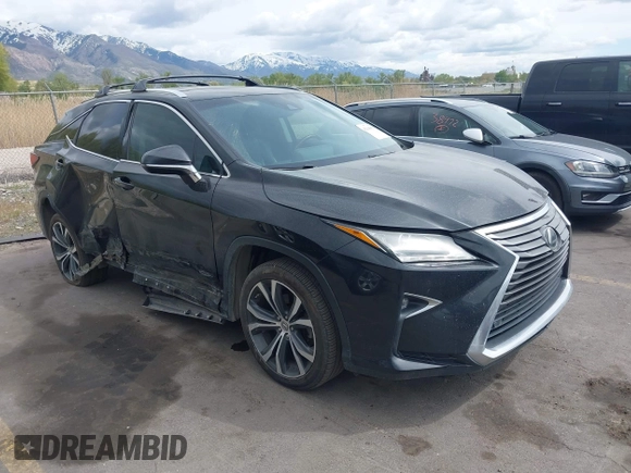 2017 Lexus RX 350 with VIN 2T2BZMCA3HC090218, listed as a IAAI auction lot 42148051 with 94,954 mi miles and . Bid and sale history available at DreamBid. Image 1.