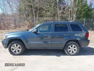2008 Jeep Grand Cherokee Laredo with VIN 1J8GR48K98C161239, listed as a IAAI auction lot 42090850 with 218,063 mi miles. Bid and sale history available at carsss.com. Image 12.