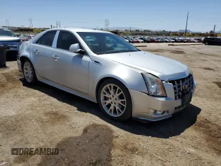 2012 Cadillac CTS Performance with VIN 1G6DK5E3XC0137143, listed as a Copart auction lot 53891815 with 123,174 mi miles and Salvage Title. Bid and sale history available at DreamBid. Image 4.
