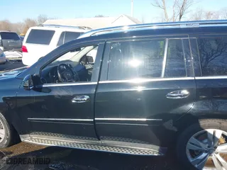 2011 Mercedes-Benz GL-Class GL 450 with VIN 4JGBF7BE6BA628596, listed as a IAAI auction lot 41737405 with 166,040 mi miles. Bid and sale history available at carsss.com. Image 14.